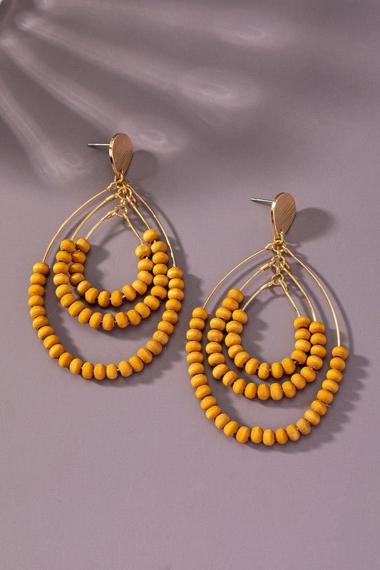 I N S T O C K Three tier wood oval hoop earrings - Robbi & Angel